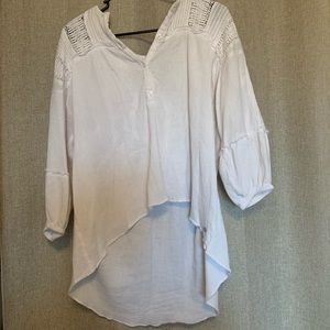 White flowy shirt.